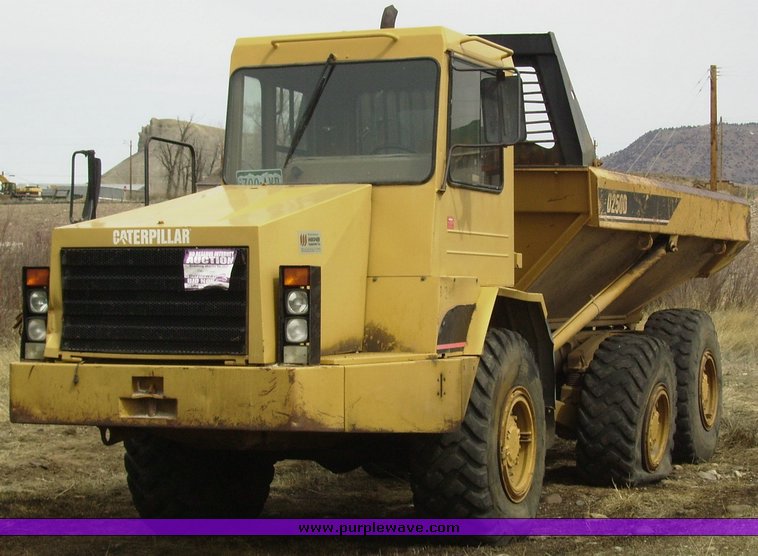 1994 Caterpillar D250D articulated dump truck - 1009
