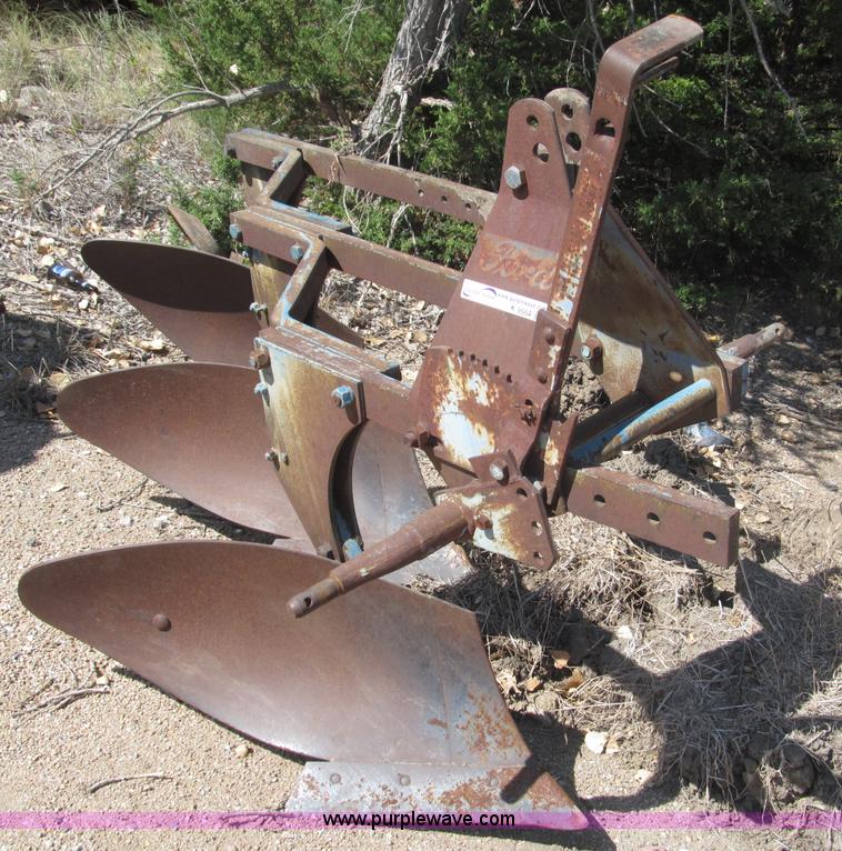 Ford three bottom plow - K9564
