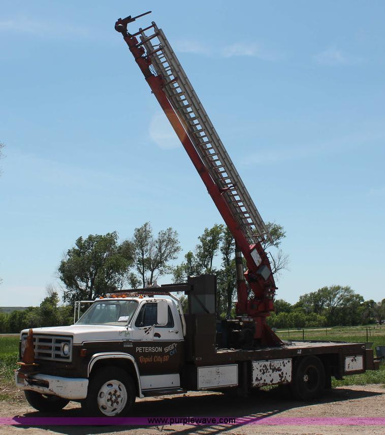1977 GMC Sierra 6500 flatbed ladder/boom truck - H3087