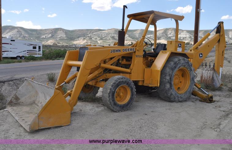 John Deere 500C backhoe - F2004