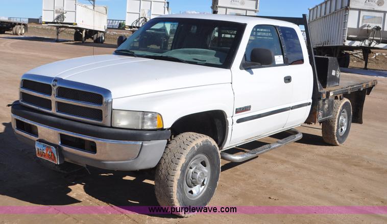 1999 Dodge Ram 2500 Quad Cab flatbed pickup truck - G7175