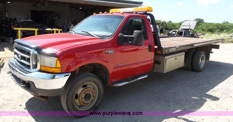 1999 Ford F550 rollback truck - BR9116