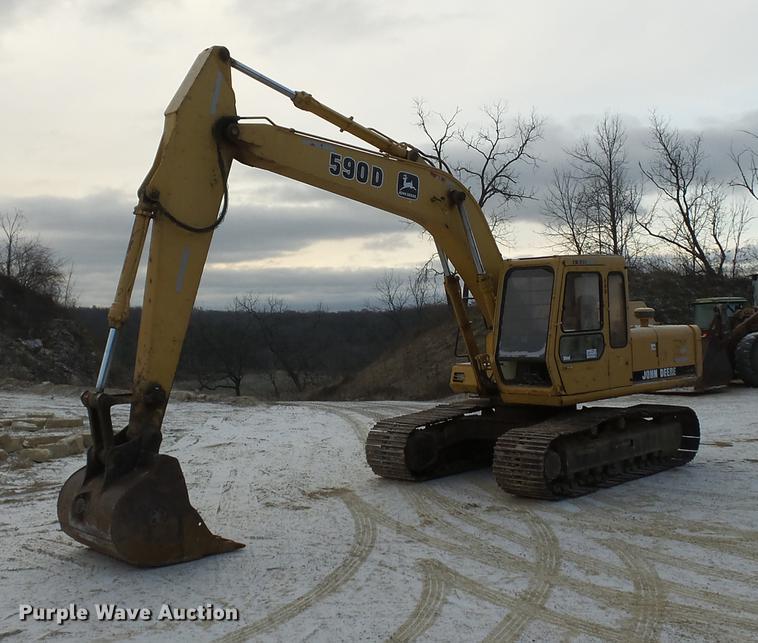 1997 John Deere 590D excavator - DA3566