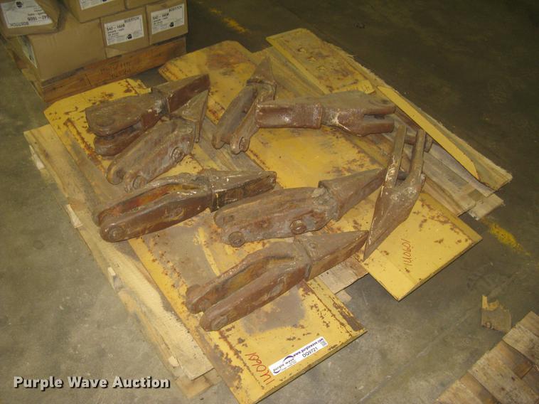 Elevating scraper cutting edges and teeth - DQ9721