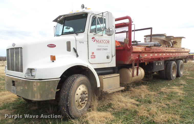 2002 Peterbilt 330 flatbed water truck - EI9723