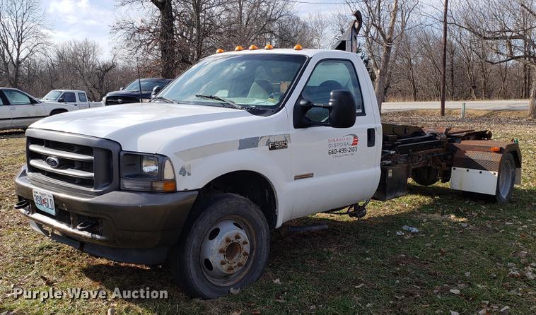 2003 Ford F550 roll-off container truck - EN9755