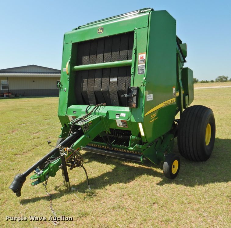 2015 John Deere 569 Mega Wide Plus  round baler - DG1432