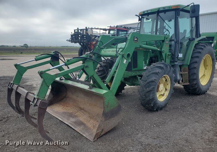 1997 John Deere 6400  MFWD tractor - DE4489