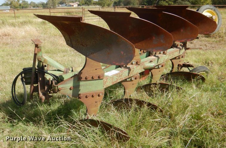 John Deere E835A four bottom rollover plow - DH5390
