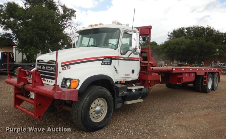 2007 Mack CV713  roll-off container truck - DM6277