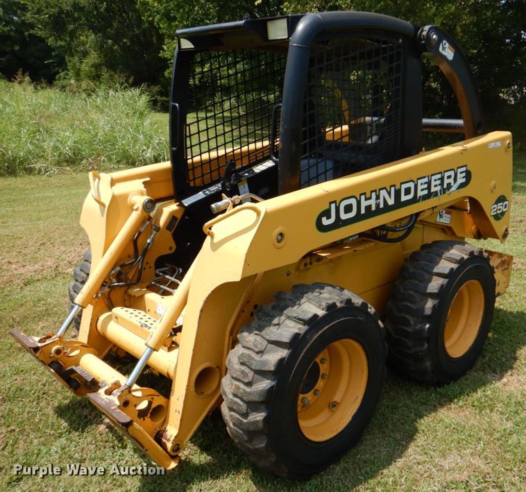 1999 John Deere 250  skid steer loader - IR9004