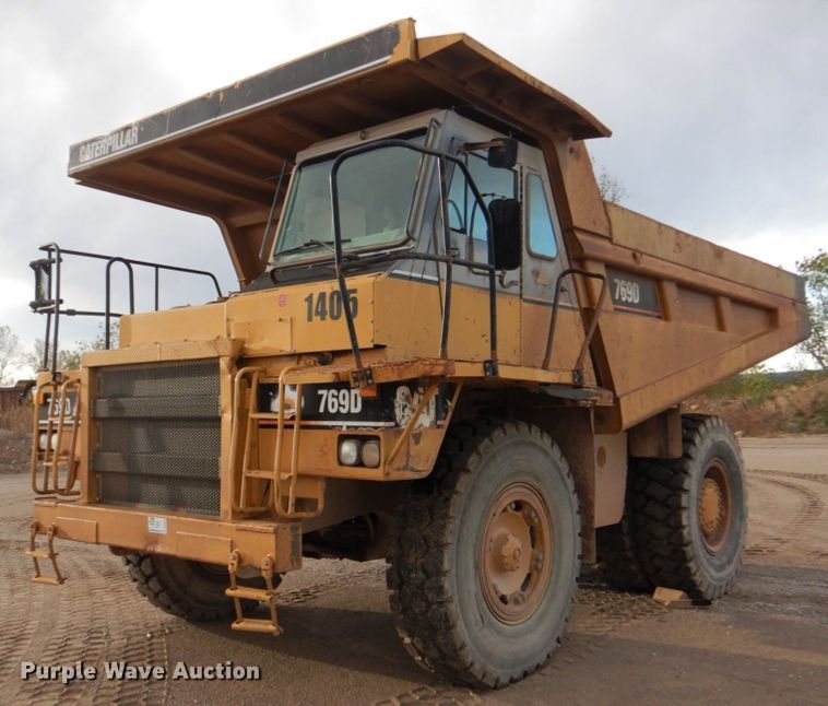 2000 Caterpillar 769D  haul truck - DN6524