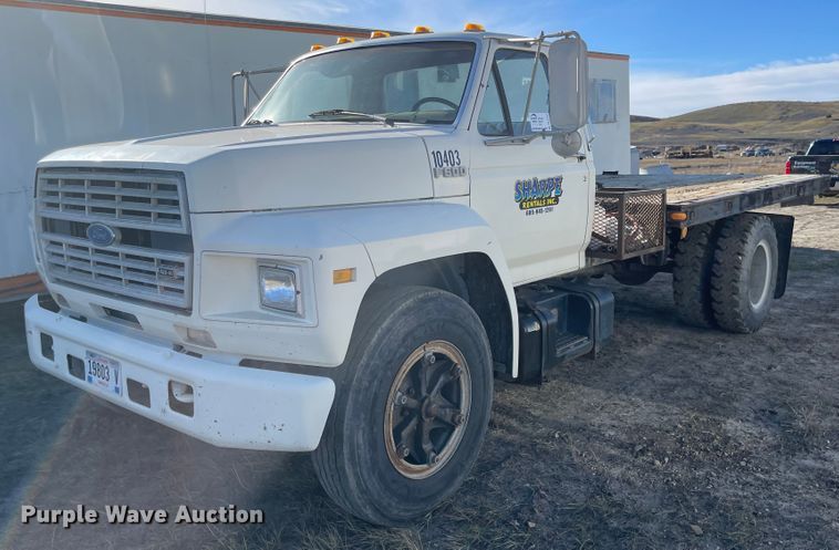 1990 Ford F600  flatbed truck - DL5797