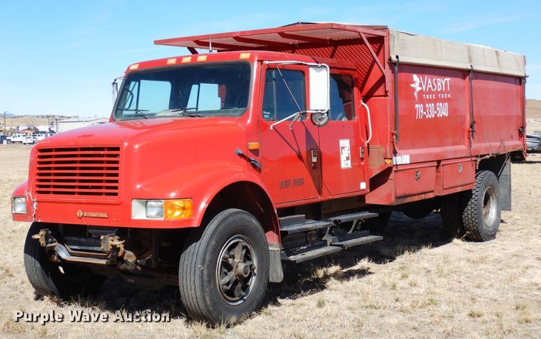 1990 International 4700  Crew Cab chipper truck - DR1147