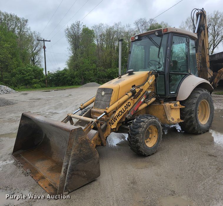 1996 New Holland 555E  backhoe - JM9073