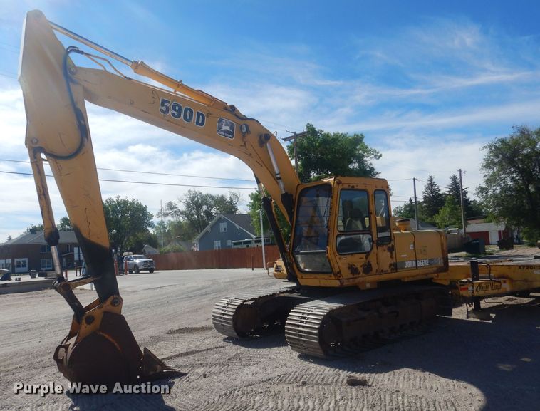 1996 John Deere 590D  excavator - HU9414