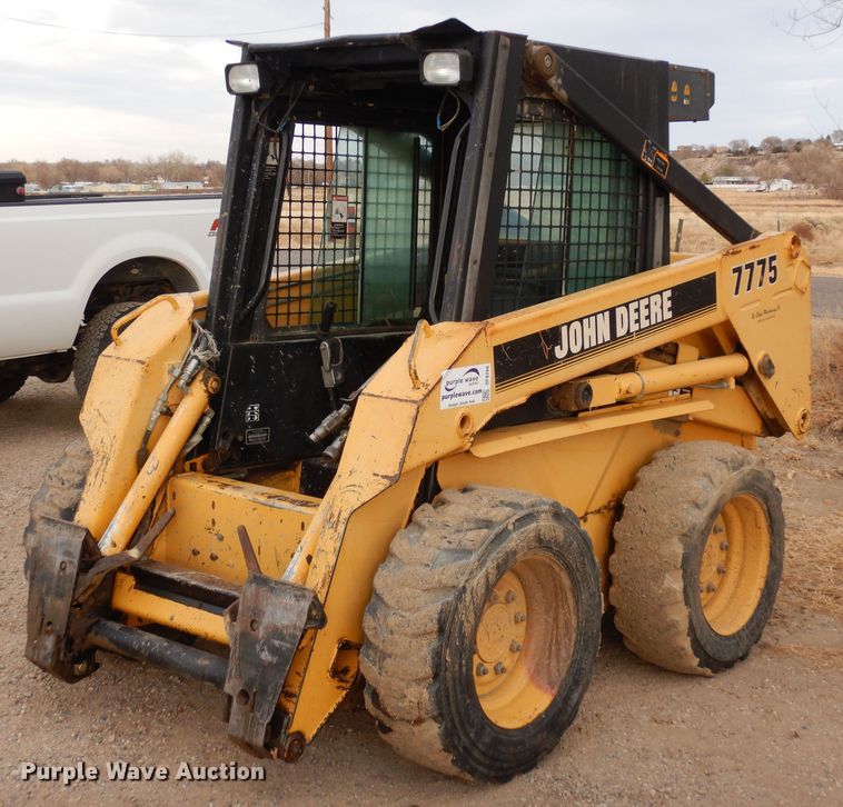 1997 John Deere 7775  skid steer loader - DF8260