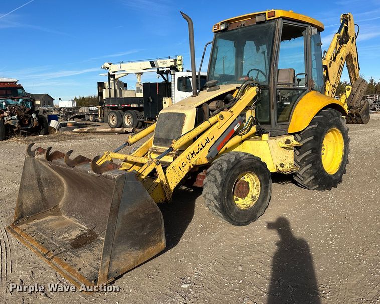 New Holland 555E  backhoe - JD9680