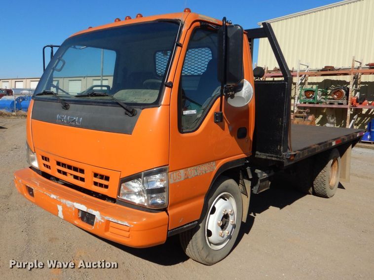 2007 Isuzu NQR  flatbed truck - LT9031