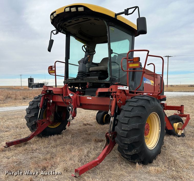 2011 New Holland H8040  swather / windrower - LT9305