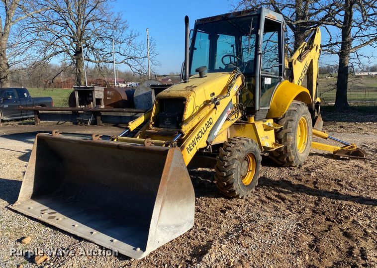 1999 New Holland 555E  backhoe - DL7076