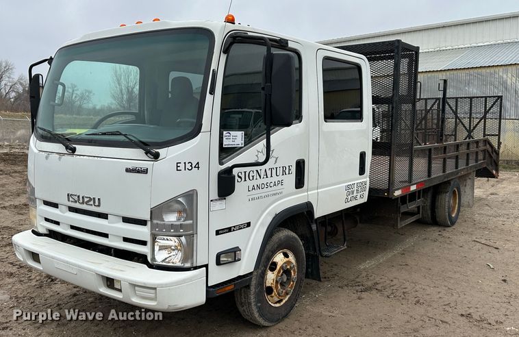 2012 Isuzu NPR  flatbed truck - DR5076