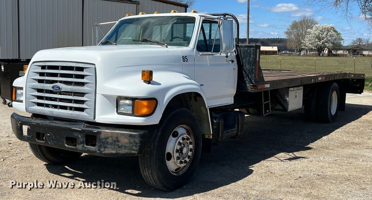 1998 Ford F700  roll-off container truck - KR9409