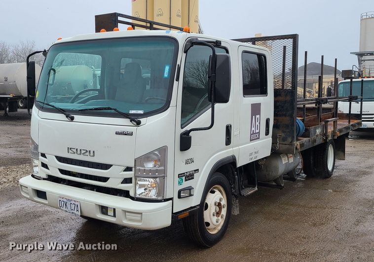 2017 Isuzu NPR  flatbed truck - LH9957