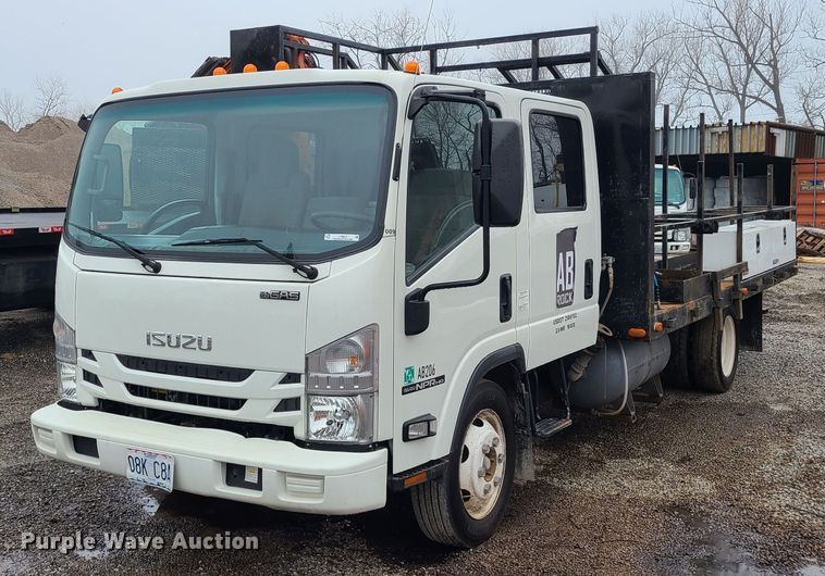 2018 Isuzu NPR  flatbed truck - LH9958