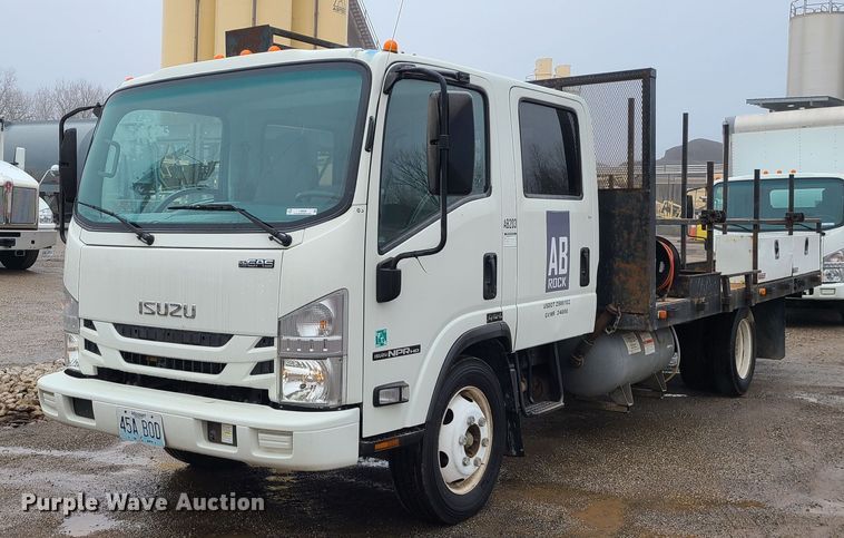 2017 Isuzu NPR  flatbed truck - LH9959