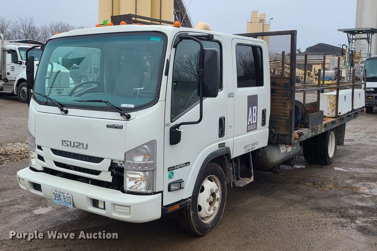 2016 Isuzu NPR  flatbed truck - LH9961
