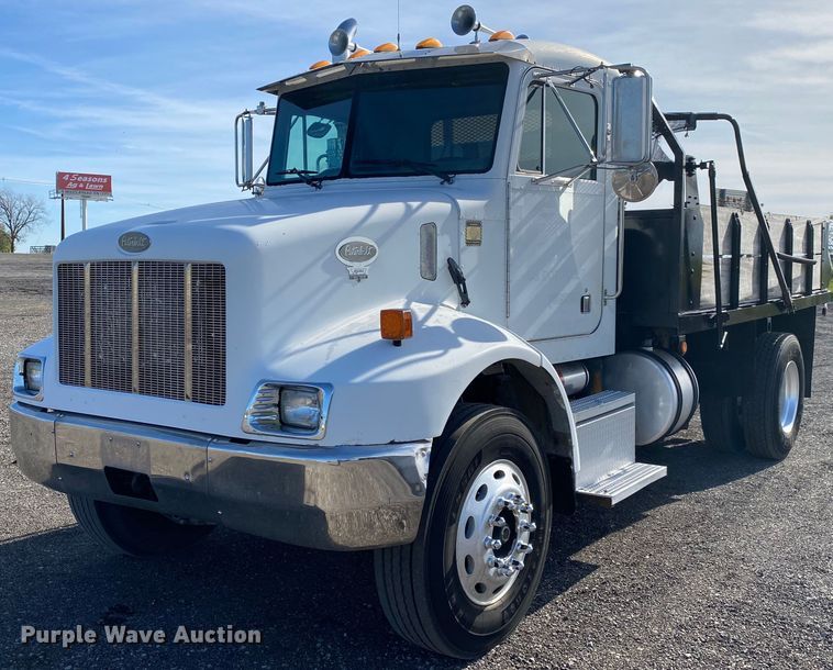 1999 Peterbilt 330  dump flatbed truck - KB9496