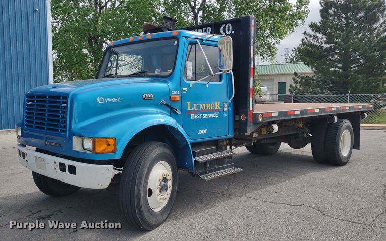 1999 International 4700  dump flatbed truck - DQ1715