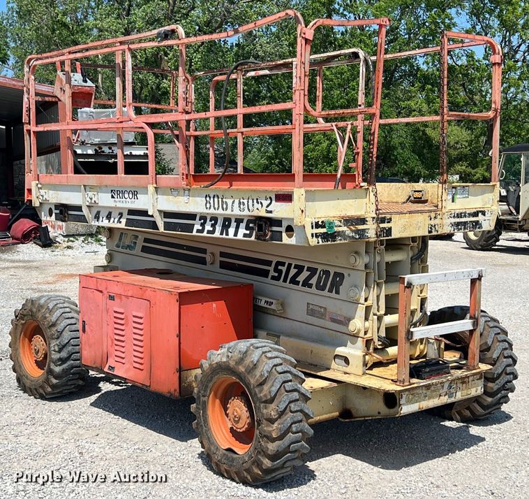 1997 JLG Sizzor 33RTS  scissor lift - LG9127