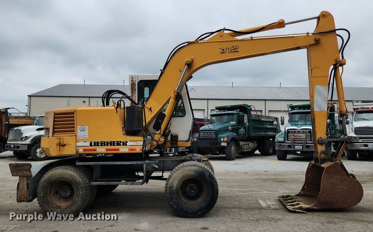 Liebherr A312  wheeled excavator - LX9591