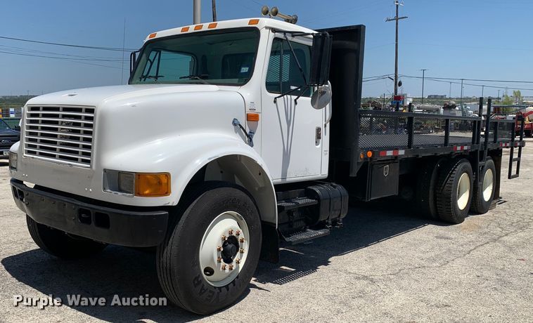 1999 International 4900  flatbed truck - LH9755