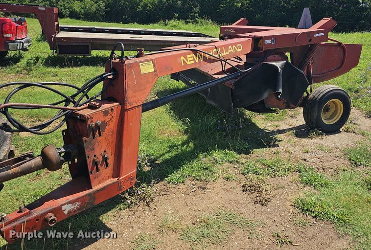 1991 New Holland 411 Discbine  swather / windrower - NT9770