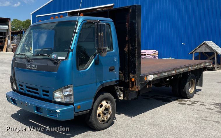 2007 Isuzu NPR  dump flatbed truck - LJ9785