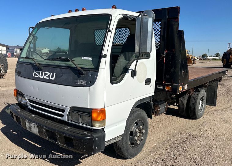1999 Isuzu NPR  dump flatbed truck - OC9388