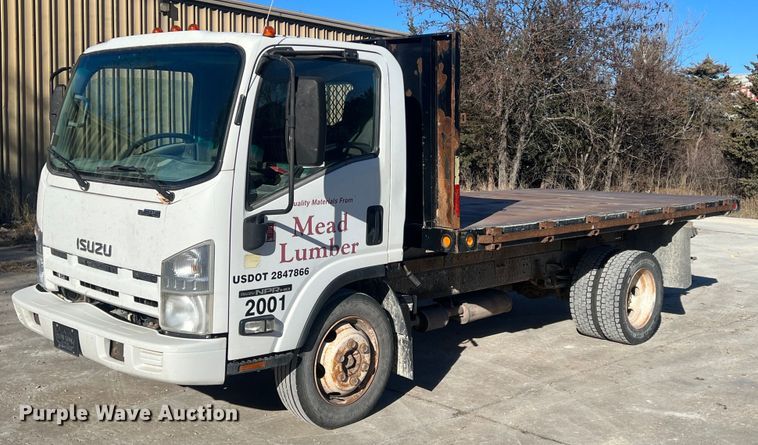2012 Isuzu NPR flatbed truck - NN9326