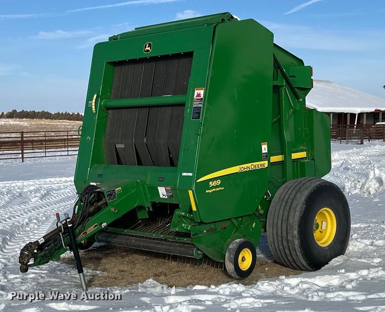 2015 John Deere 569 round baler - NS9173