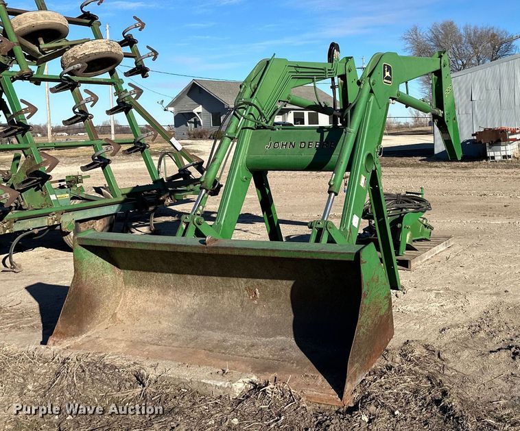 John Deere 740 loader attachment - DQ6323