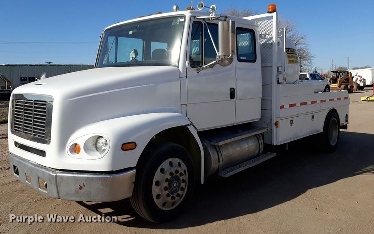 1996 Freightliner FL112 flatbed truck - DV9845