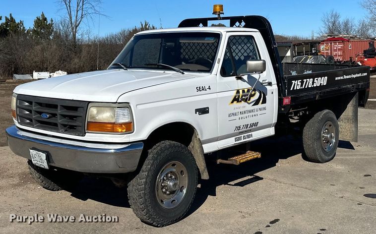 1997 Ford  F350 flatbed pickup truck - LO9503