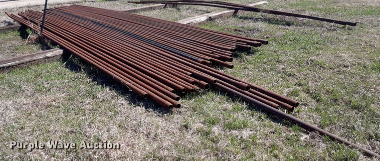 Approximately 43 joints of 30' L x 2 3/8" diameter oilfield pipe - DV9913