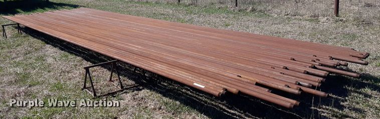 Approximately 49 joints of 2 1/16" diameter bell collar tubing - DV9916