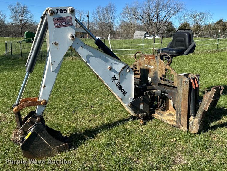 Bobcat 709FDS skid steer backhoe - EH6649