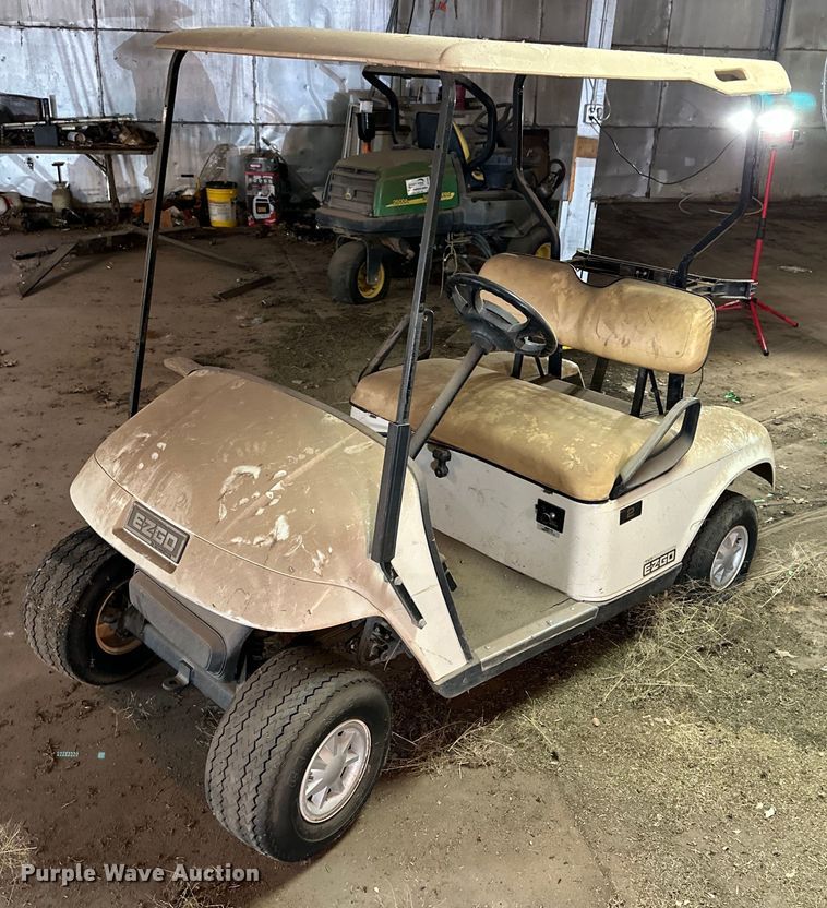(4) EZ-GO golf carts  - DG4357