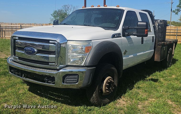 2014 Ford F550 Super Duty flatbed truck - EJ6304