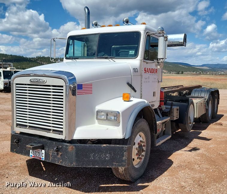 1999 Freightliner  FL112 roll-off container truck - NZ9765